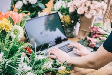 Small business florist looking at their website